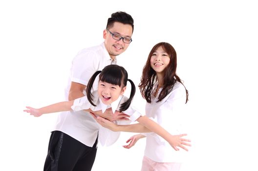 Indoor portrait of a happy asian family