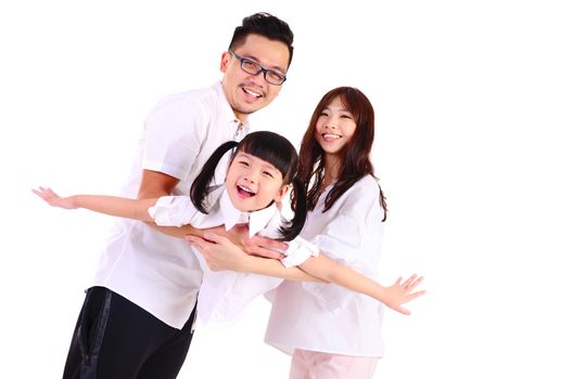 Indoor portrait of a happy asian family