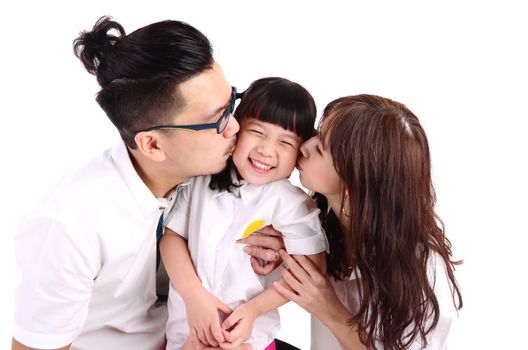 asian parent kissing their cute little girl