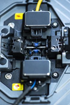 Device for mounting optical cable. Optical internet Technology concept. Optical fiber assembly.