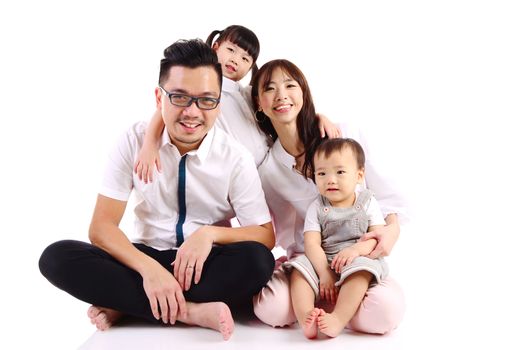 Indoor portrait of a happy asian family