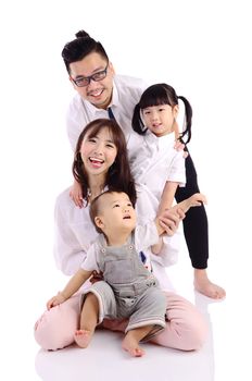 Indoor portrait of a happy asian family