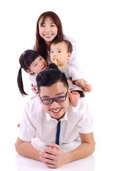 Indoor portrait of a happy asian family