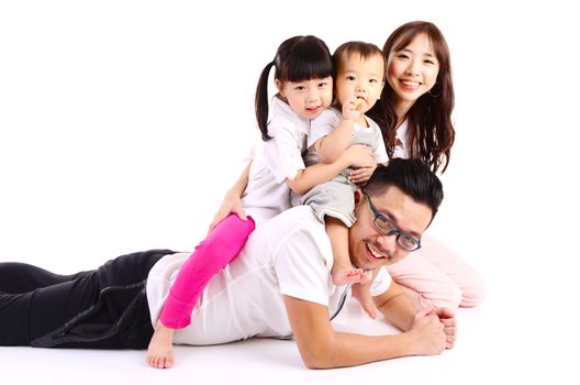 Indoor portrait of asian family at home