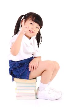 Asian girl  sitting on the floor with books