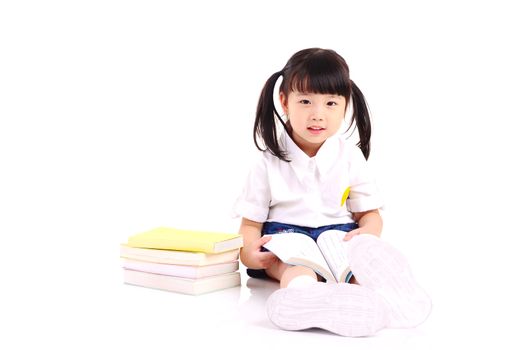 Asian girl sitting on the floor and reading book