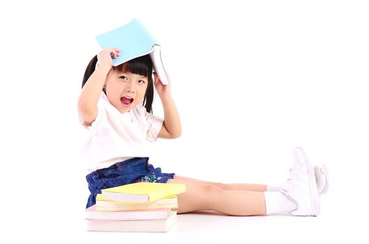 Asian girl sitting on the floor and reading book