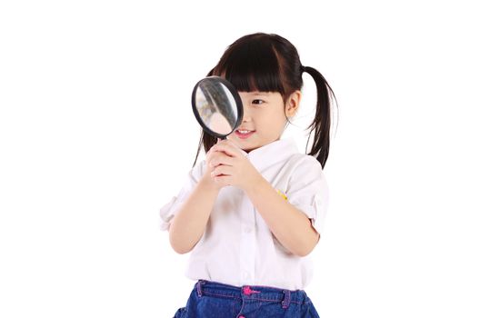 little asian girl looking through magnifying glass , isolated on white background. School, education concept.