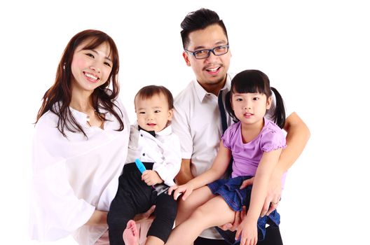 Indoor portrait of a happy asian family