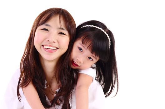 Asian mother and her daughter indoor portrait