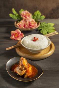 sardines fish in tomato sauce served with steamed rice