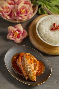 sardines fish in tomato sauce served with steamed rice