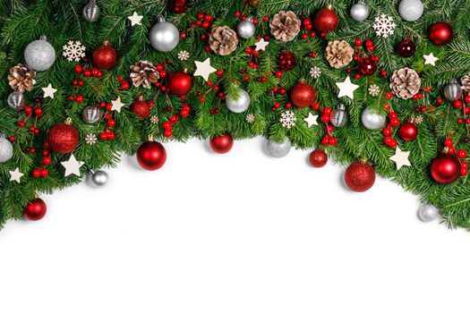 Christmas New year decoration frame isolated on white , fir tree branches , red and silver baubles and pine cones , copy space for text
