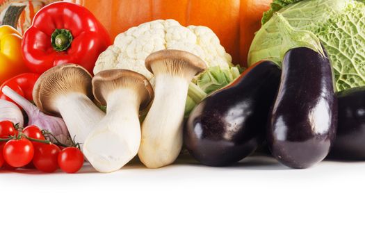 Harvest of many vegetables isolated on white background border frame with copy space for text