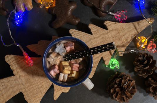 Marshmallow and milk on christmas table. Tree shape