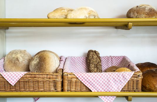 Bread in bakery shelf. Small neighborhood bakery