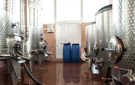 Wine fermenters in winery