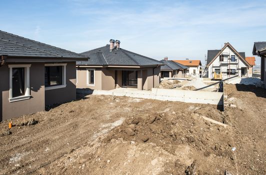 New build houses. Sunny day. Construction site