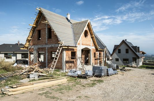 Building a new houses. Sunny day