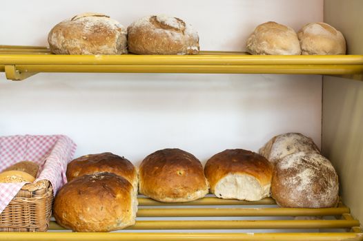Bread in bakery shelf. Small neighborhood bakery