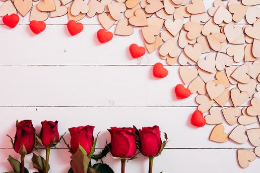 Wood hearts on white wooden background with copy space, valentine day concept