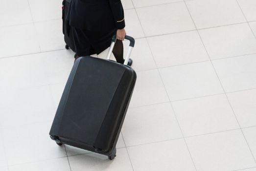 People traveling luggage bag he walking in air port terminal building