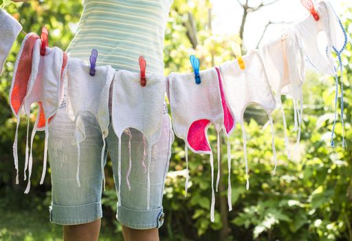 Baby bibs on laundry