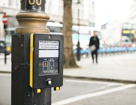 Pedestrian traffic light button. London street