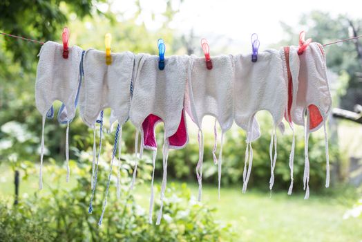 Baby bibs on laundry