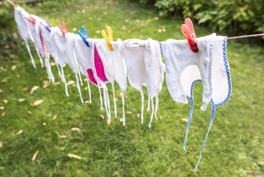 Baby bibs on laundry