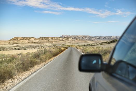 Tourist car and vintage dirt road