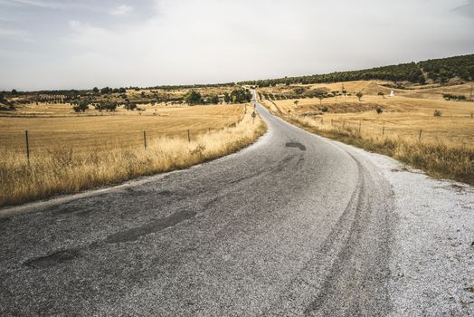 Road and dramatic cloudy sky