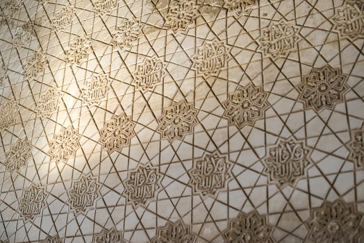 Islamic ornaments on wall. Arab symbols.