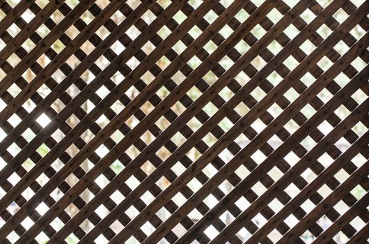 Latticed wooden partition. Back light