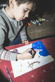 Child painting. Direct on camera flash