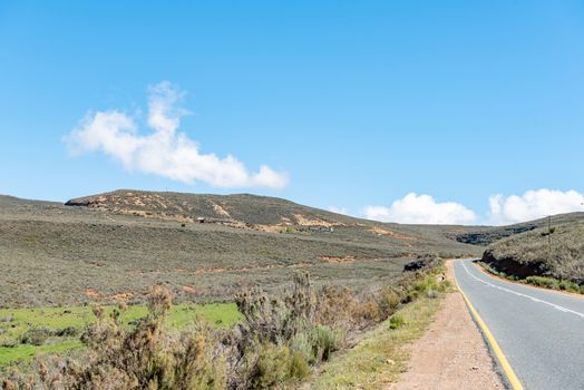 The Hottentotskloof Pass on road R46 near Ceres in the Western Cape Province. A trucks is visible