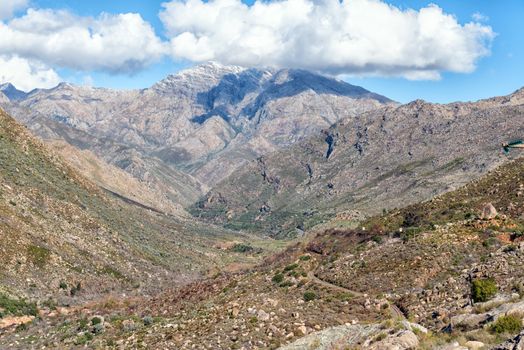 The Ceres Mountain Fynbos Reserve. The Mitchells road and railroad passes near Ceres in the Western Cape Province are visible. Snow is visible on the mountains
