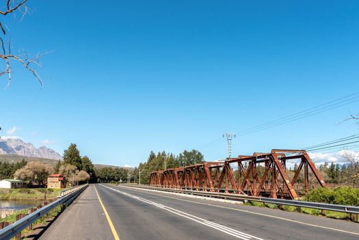 The road bridge and historic railway bridge over the Breede River at Wolseley in the Western Cape Province. An historic blockhouse is visible