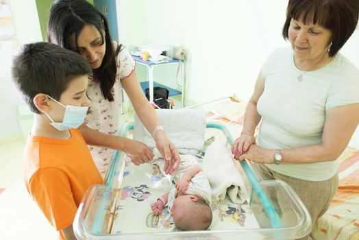 Newborn baby in a hospital. Baby room