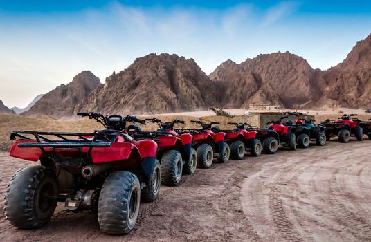series of ATVs on the background of mountains in the desert of Sharm El Sheikh Egypt