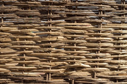 texture of wooden wicker fence close up