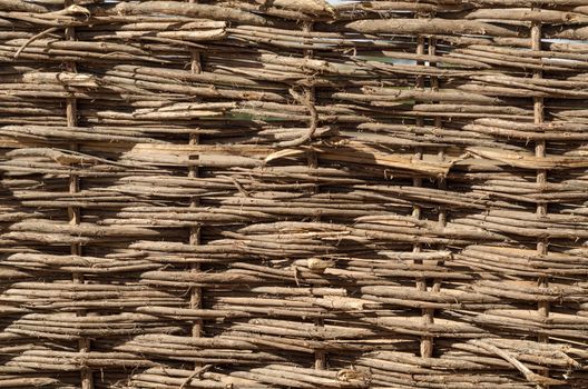 texture of wooden wicker fence close up