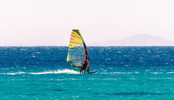 surfer rides in the Red Sea in Egypt