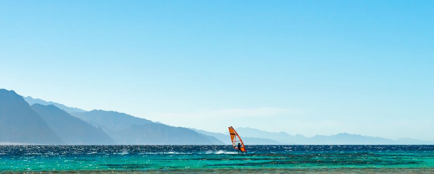 surfer rides in the Red Sea in Egypt