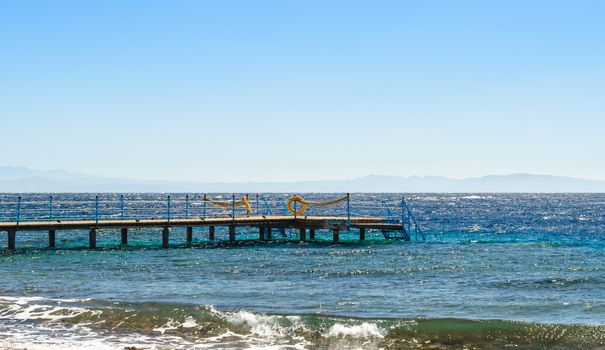 platform with orange lifeline in the Red Sea in Egypt Dahab