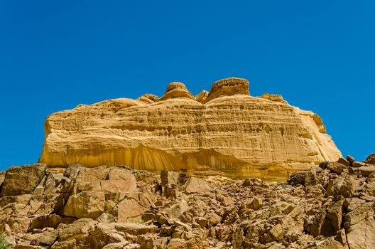high mountains against the blue sky