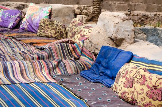 colored carpets and pillows in a Bedouin village in Egypt Dahab