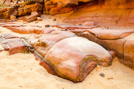 big stones and rocks in a colored canyon