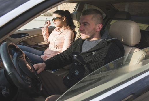  Young boy and women in car traveling