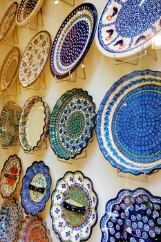 Wall view with beautiful multi-colored porcelain plates